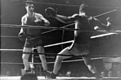 Kuva: Sten Suvio ottelee. - Suomen Urheilumuseo.