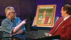 Kuva: Martti Innanen ja Fredi katselevat Innasen taulua 